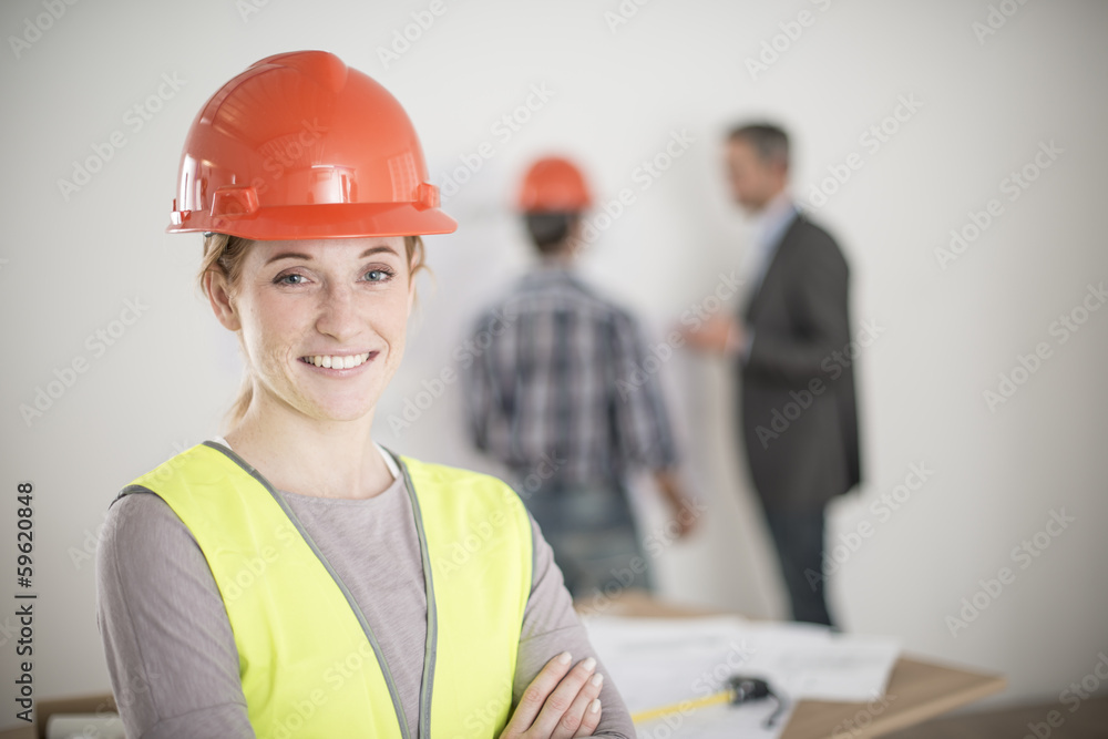 female foreman during a meeting about a build project female foreman during a meeting about a build project