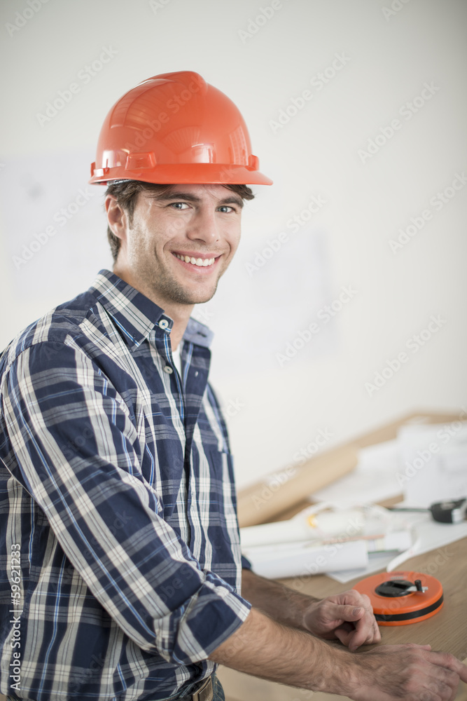 foreman during a meeting about a build project foreman during a meeting about a build project