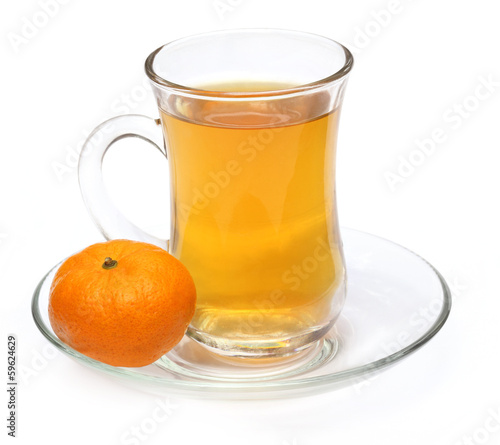 Cup of orange tea with orange