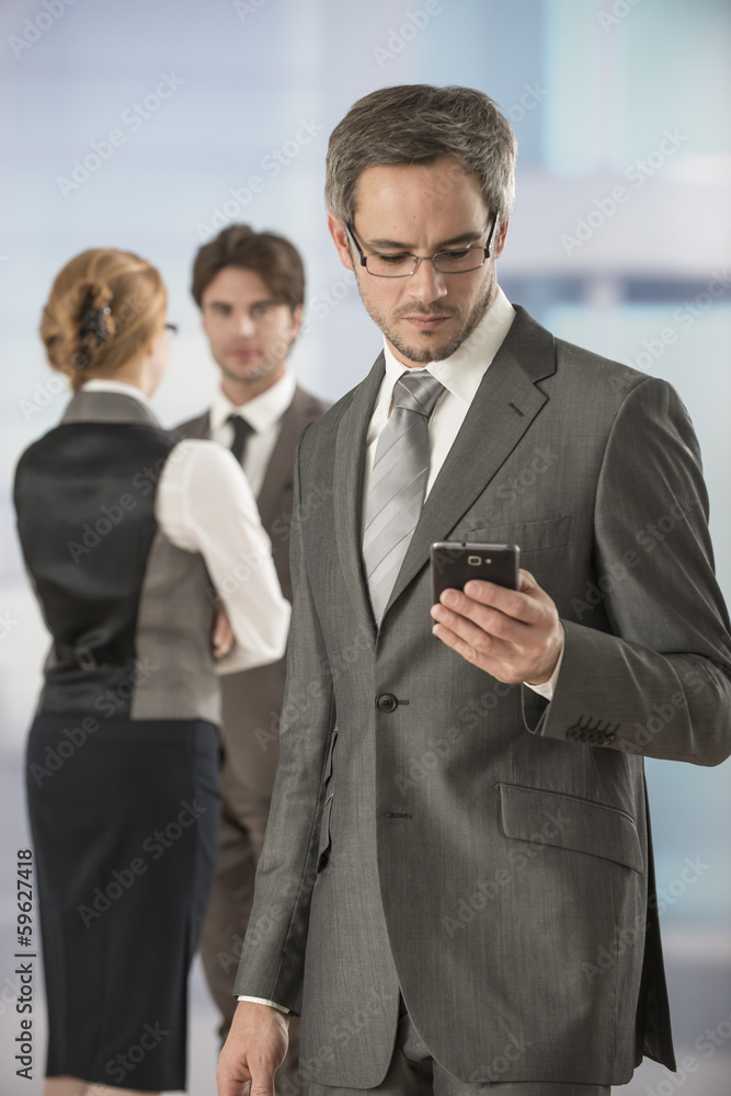 portrait of a businessman at phone in workplace portrait of a businessman at phone in workplace
