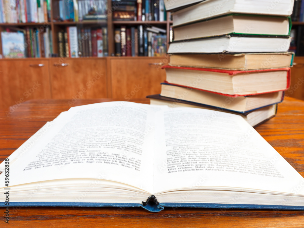 open book on wooden table open book on wooden table