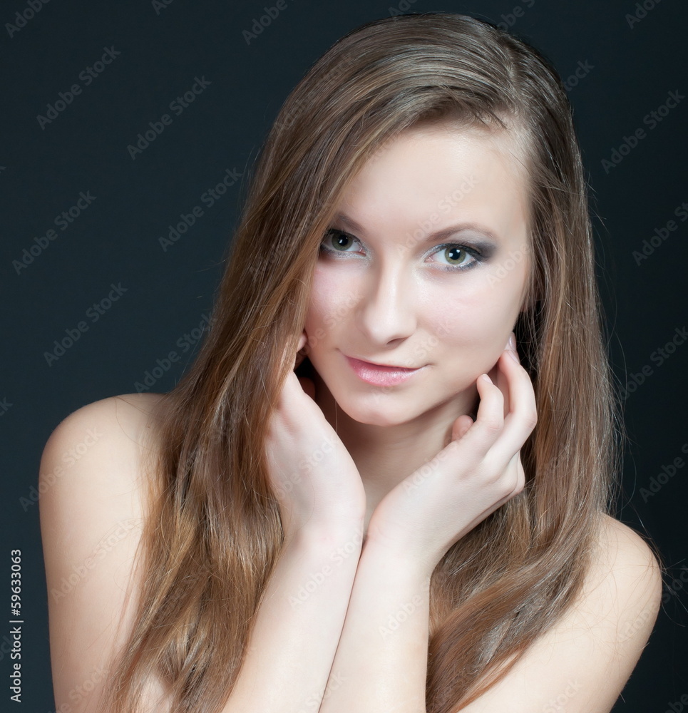 Fashion studio portrait of gorgeous young girl. Fashion studio portrait of gorgeous young girl.