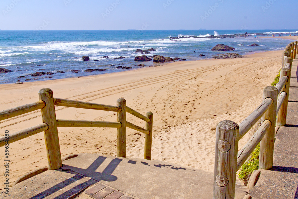 Stairway With Wooden Handrail Leading Onto Beach Stairway With Wooden Handrail Leading Onto Beach