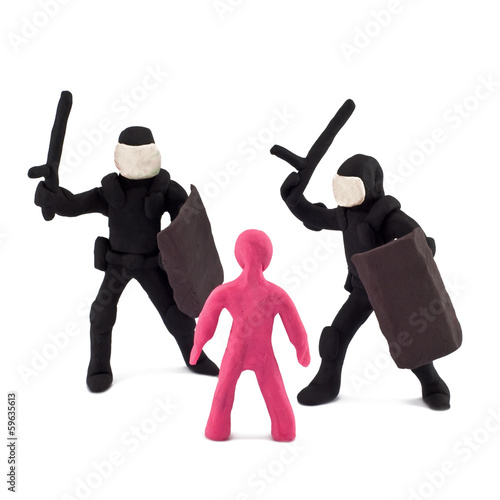 Plasticine police beating children photo