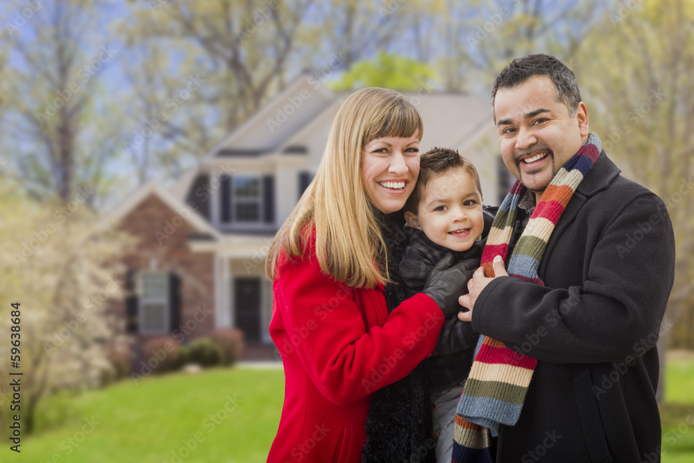 Fototapeta premium Happy Mixed Race Family in Front of House