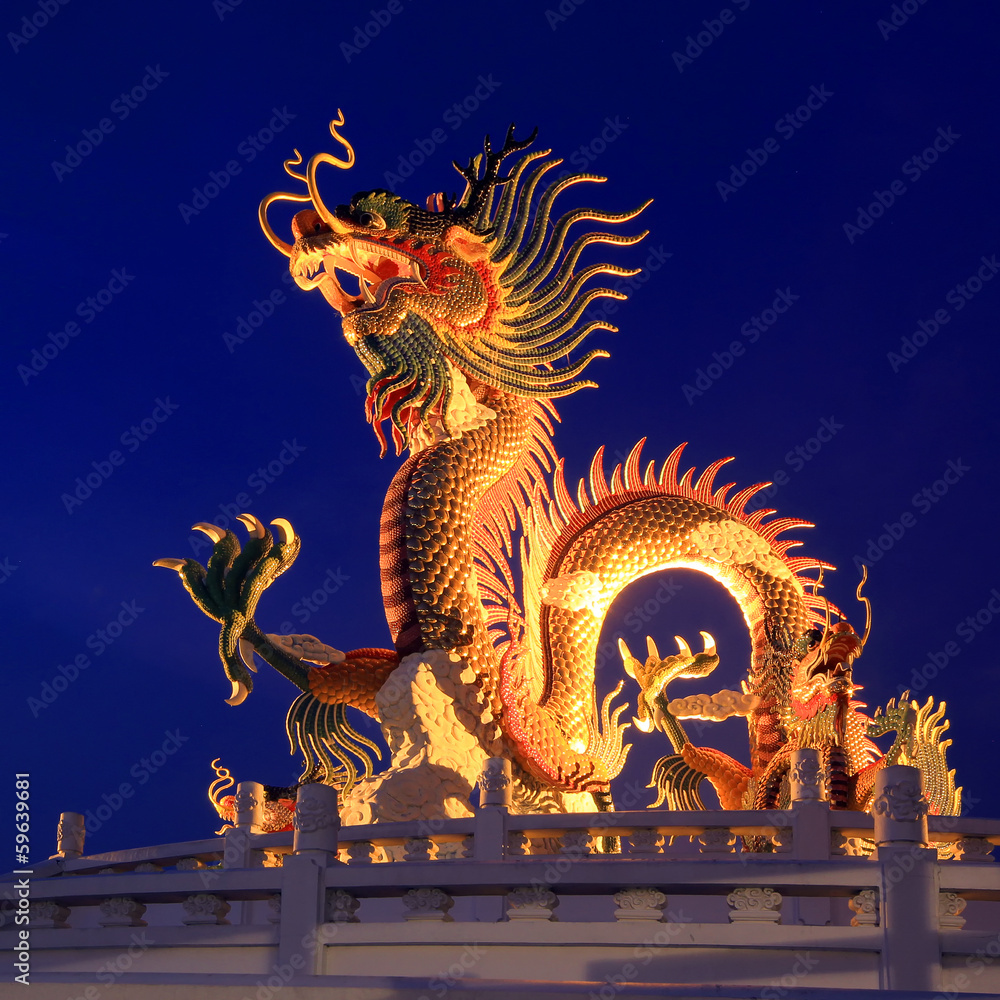 Fototapeta premium golden dragon on beautiful sky background