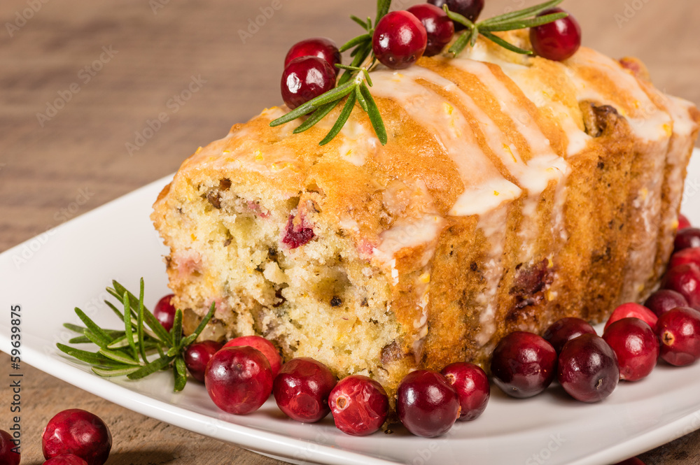 Cranberry walnut bread on a white plate Cranberry walnut bread on a white plate