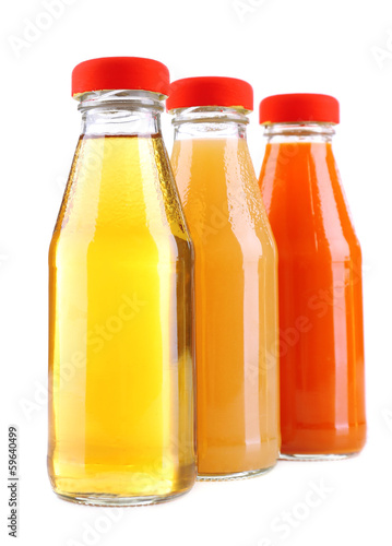 Baby food (juices) in glass jars, isolated on white