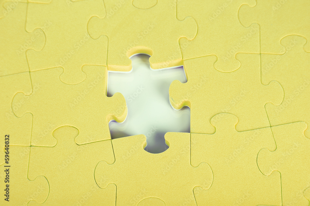 Last piece of jigsaw puzzle, close-up Last piece of jigsaw puzzle, close-up