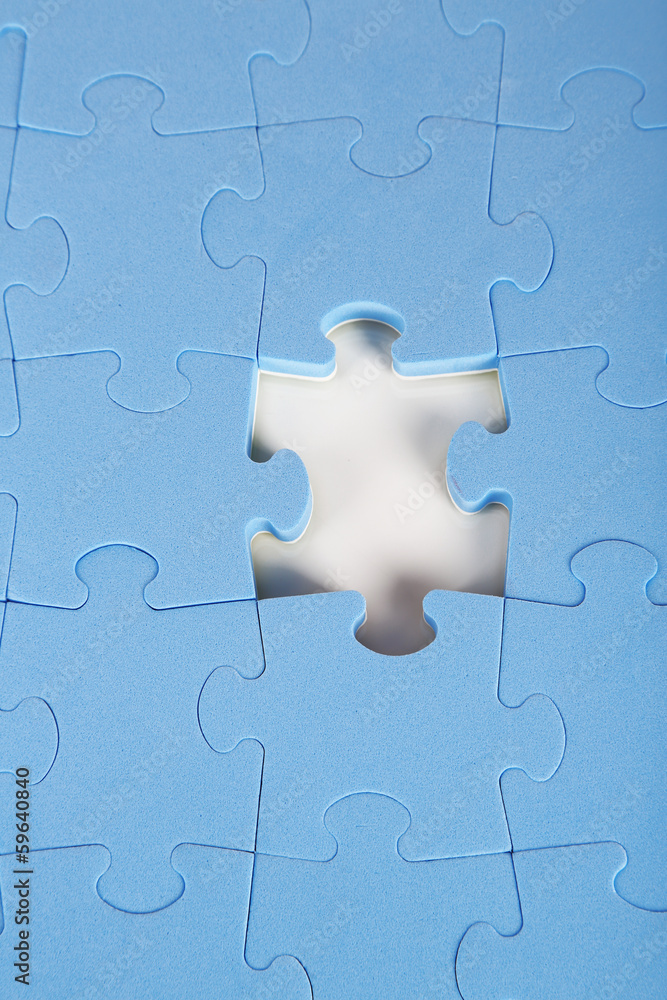 Last piece of jigsaw puzzle, close-up Last piece of jigsaw puzzle, close-up