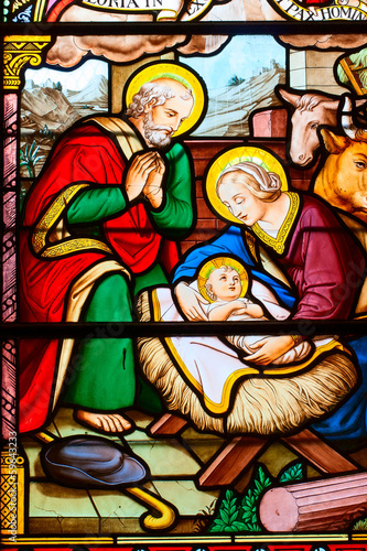 The nativity of Jesus by mosaic glass.