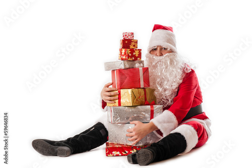 Canvas-taulu greedy Santa Claus and gifts pyramid