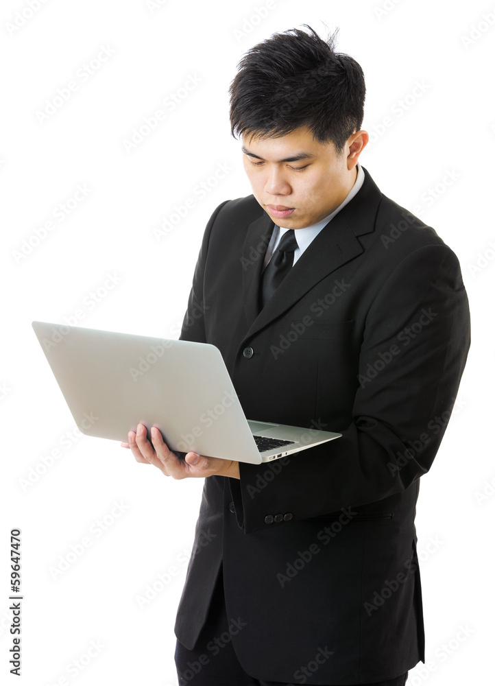 young business man using laptop computer young business man using laptop computer