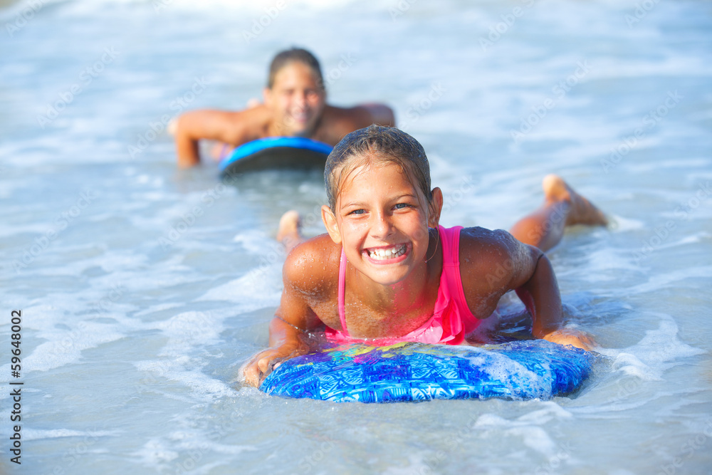 Summer vacation - surfer girls.