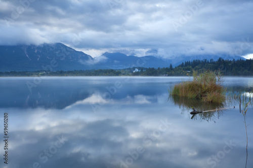 clouded sky over Barmsee lake