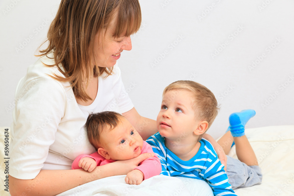 mother with two kids enjoying time together mother with two kids enjoying time together