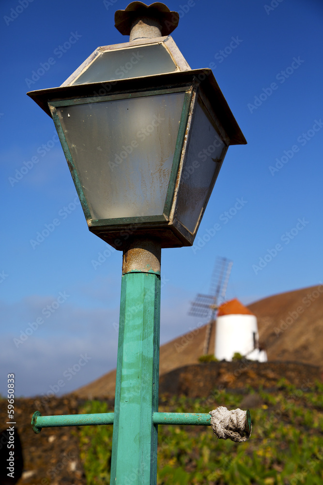 windmills spain street lamp a bulb in the blue