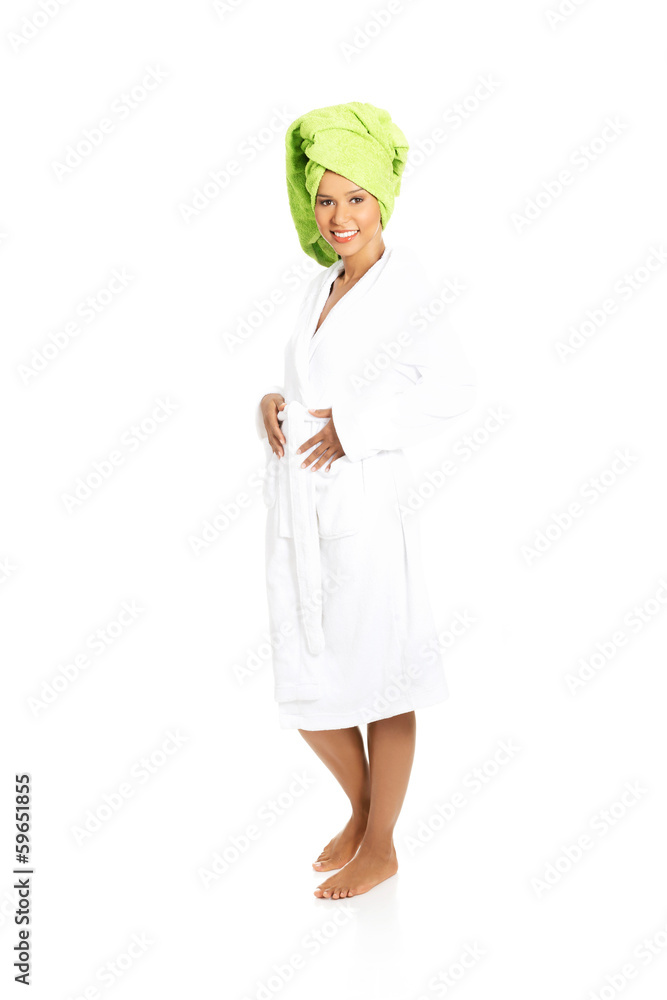 Attractive woman wrapped in towel with turban. Attractive woman wrapped in towel with turban.