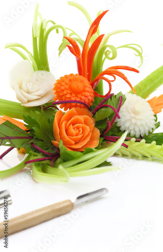 Decorative white flower carved from vegetable 