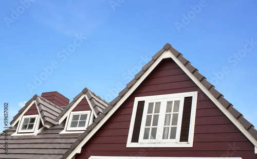 Wallpaper Mural Brown tile roof in garden agains Torontodigital.ca