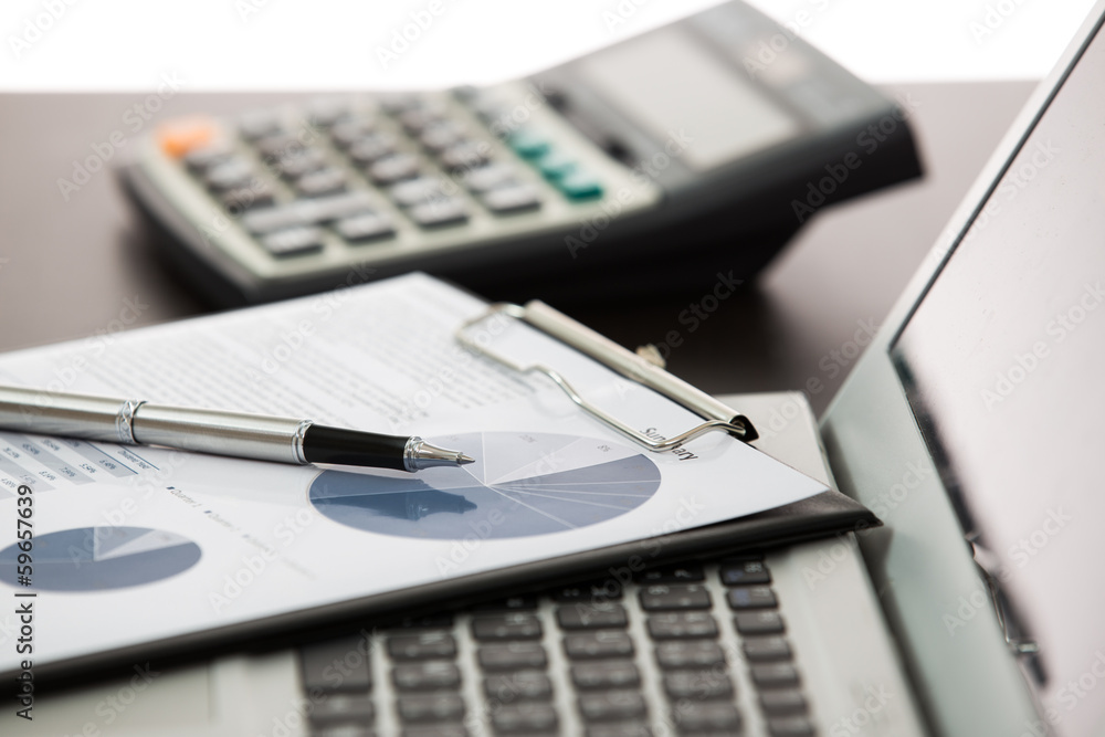 Businessman analyzing investment charts Businessman analyzing investment charts
