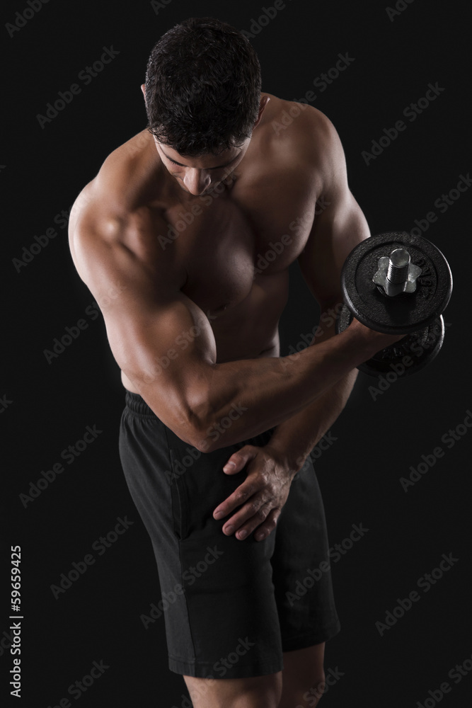 Muscular man lifting weights Muscular man lifting weights