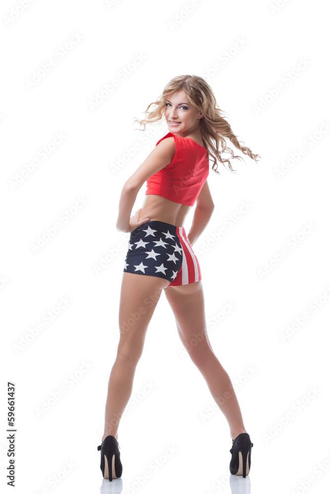 Playful slim woman posing in patriotic costume Playful slim woman posing in patriotic costume