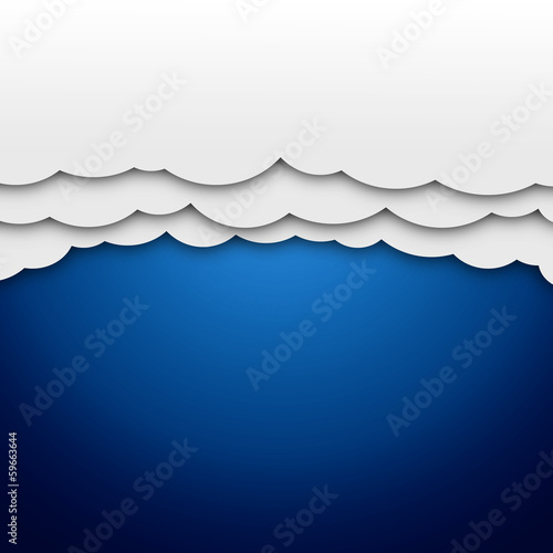 White paper clouds on blue background