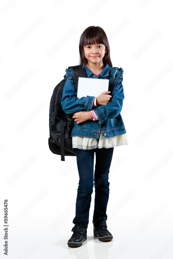 Little asian girl standing and holding books Little asian girl standing and holding books