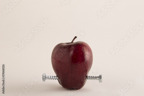 GMO frankenfood:  apple with bolts