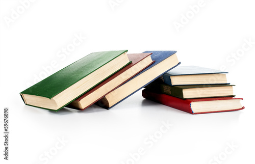 Pile of books isolated on white background.