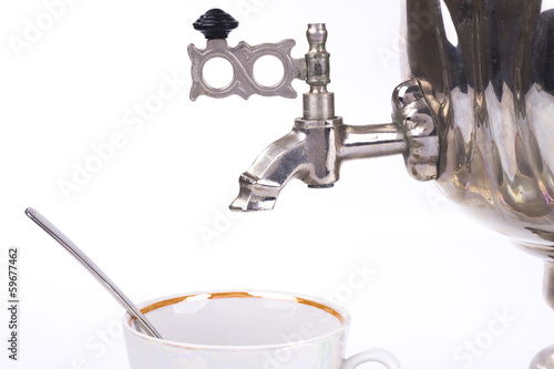 Traditional russian tea kettle faucet and teacup
