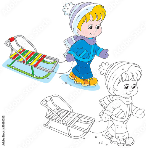Child walks with a sleigh