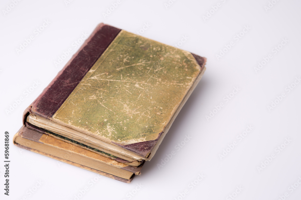 Beautiful old two books closeup on white background Beautiful old two books closeup on white background