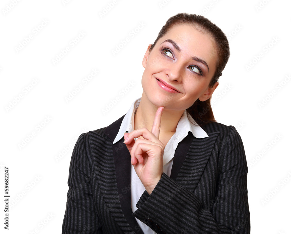 Smiling business woman thinking with finger under face Smiling business woman thinking with finger under face