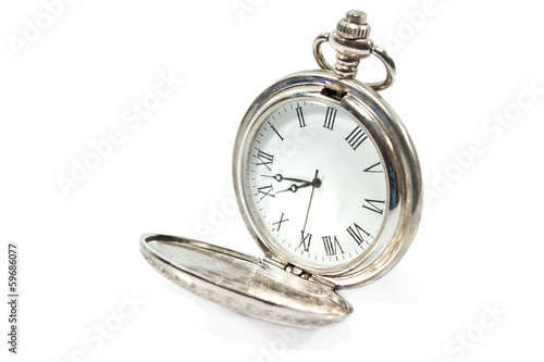 Old pocket watch  isolated on white