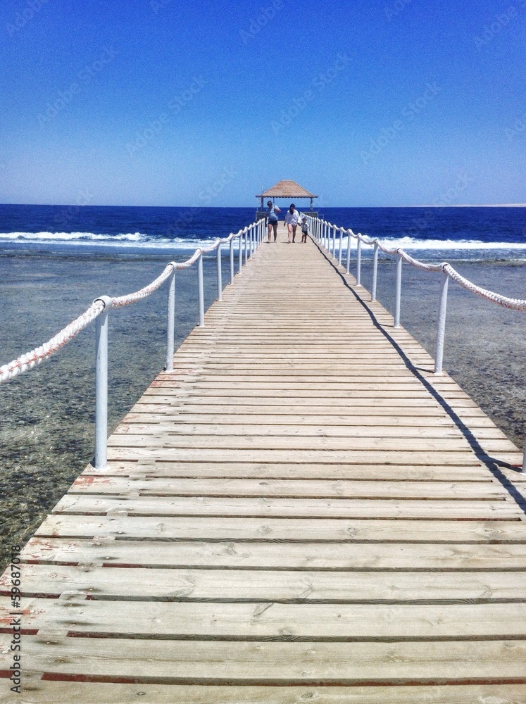jetty on clean beach jetty on clean beach