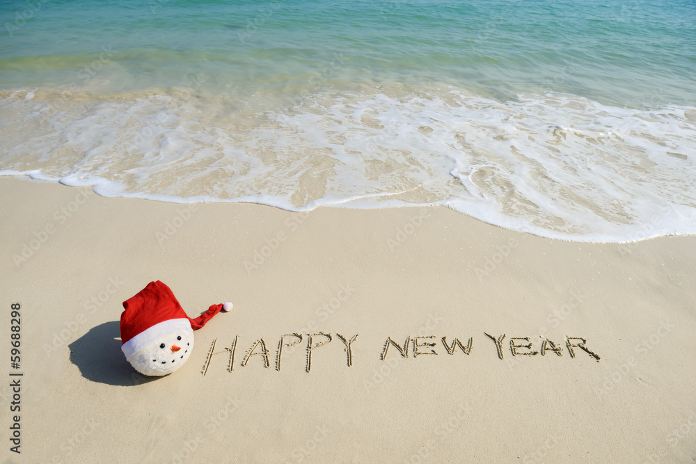 happy new year message on the sand beach happy new year message on the sand beach