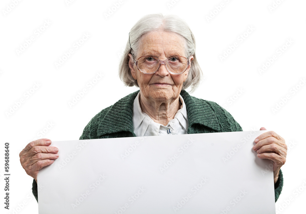 Happy elderly lady holding blank sheet in hand over white Happy elderly lady holding blank sheet in hand over white
