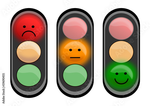 Three traffic lights with smiley faces