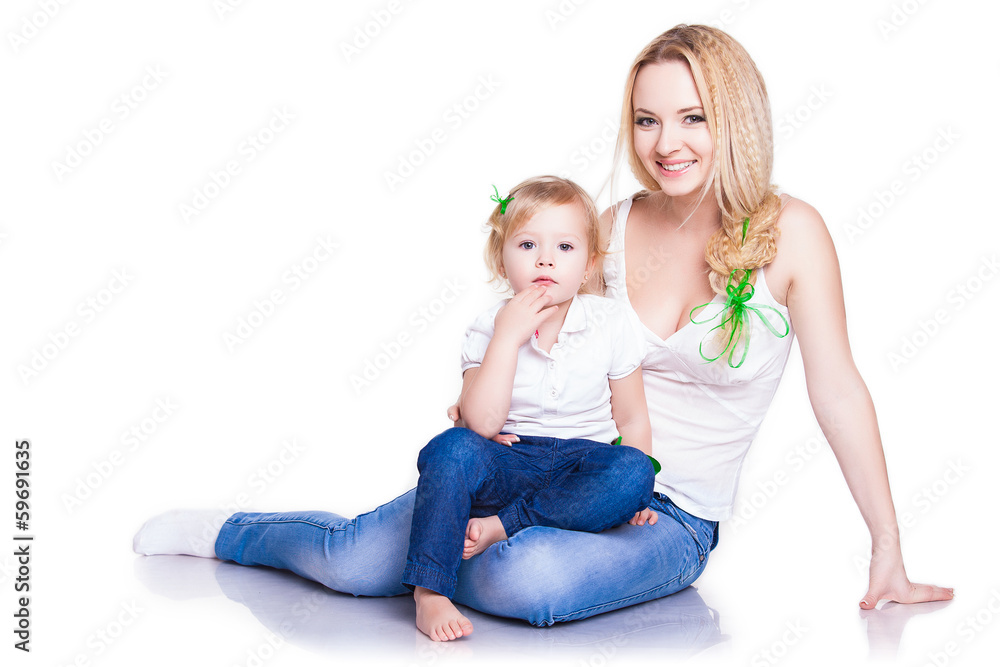closeup portrait of young mother hug her little daughter closeup portrait of young mother hug her little daughter
