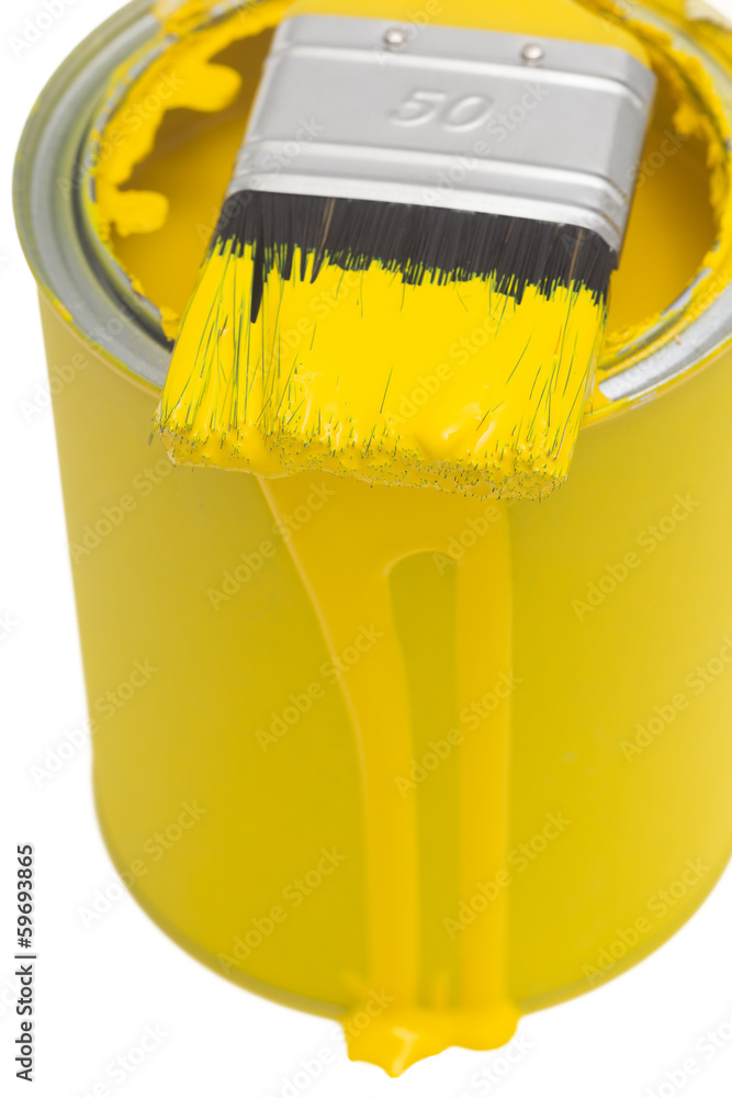 Gelbe Farbdose mit Pinsel Gelbe Farbdose mit Pinsel