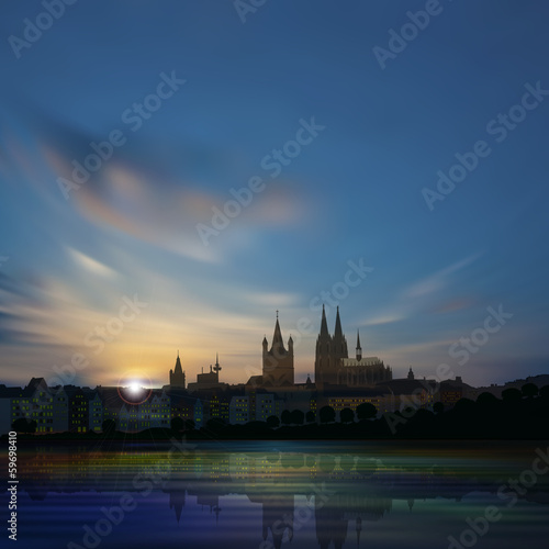 abstract background with silhouette of koln and sunset