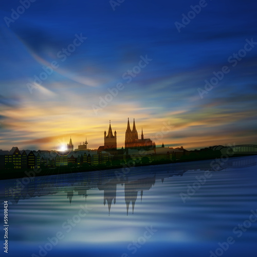 abstract background with silhouette of koln and sunset