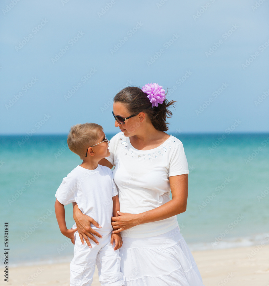 Mother and son having fun on the beach Mother and son having fun on the beach