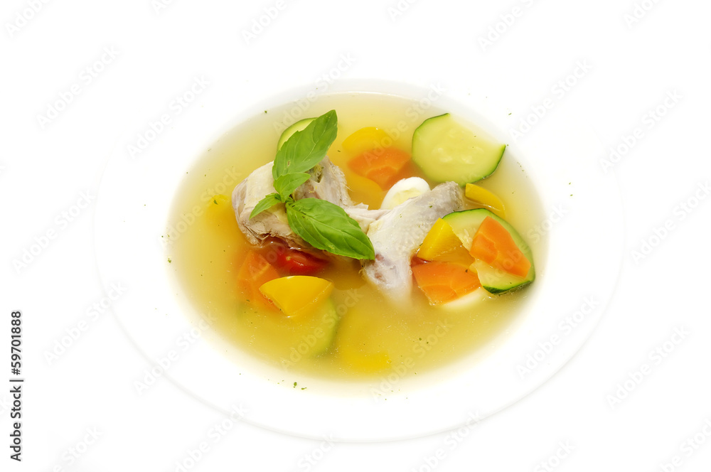 quail soup and vegetables on a white background