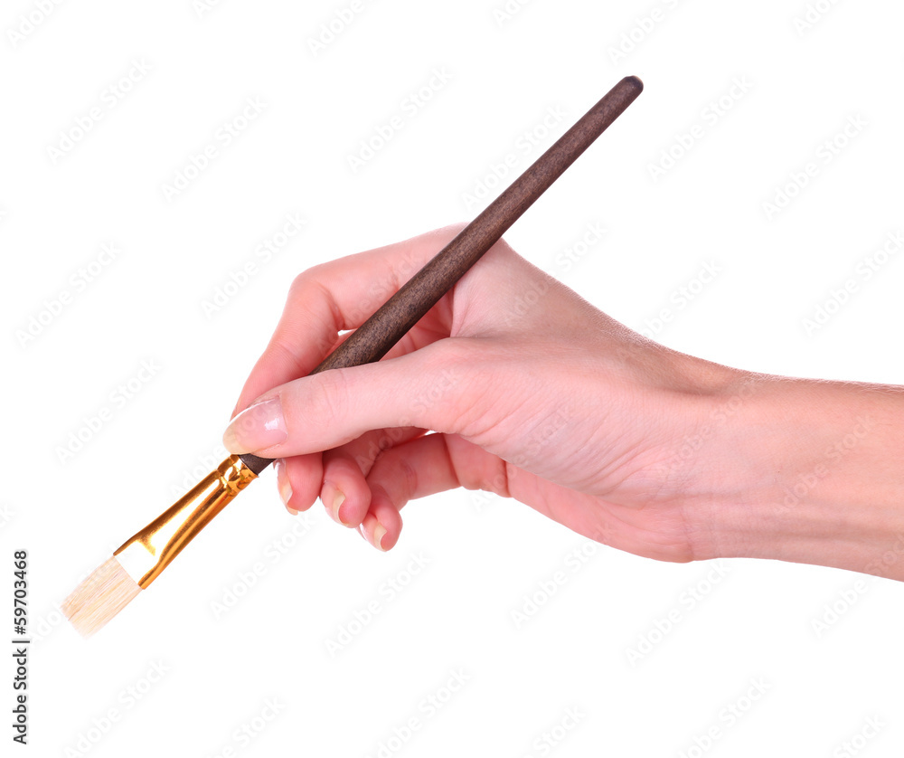 Hand holding brush isolated on white Hand holding brush isolated on white