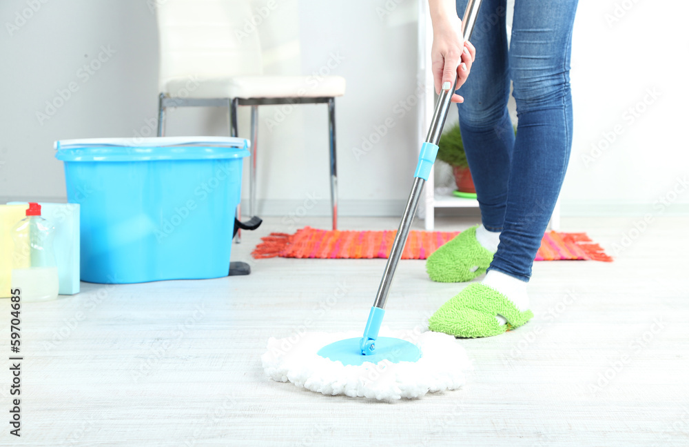 Mopping floor at home close-up Mopping floor at home close-up