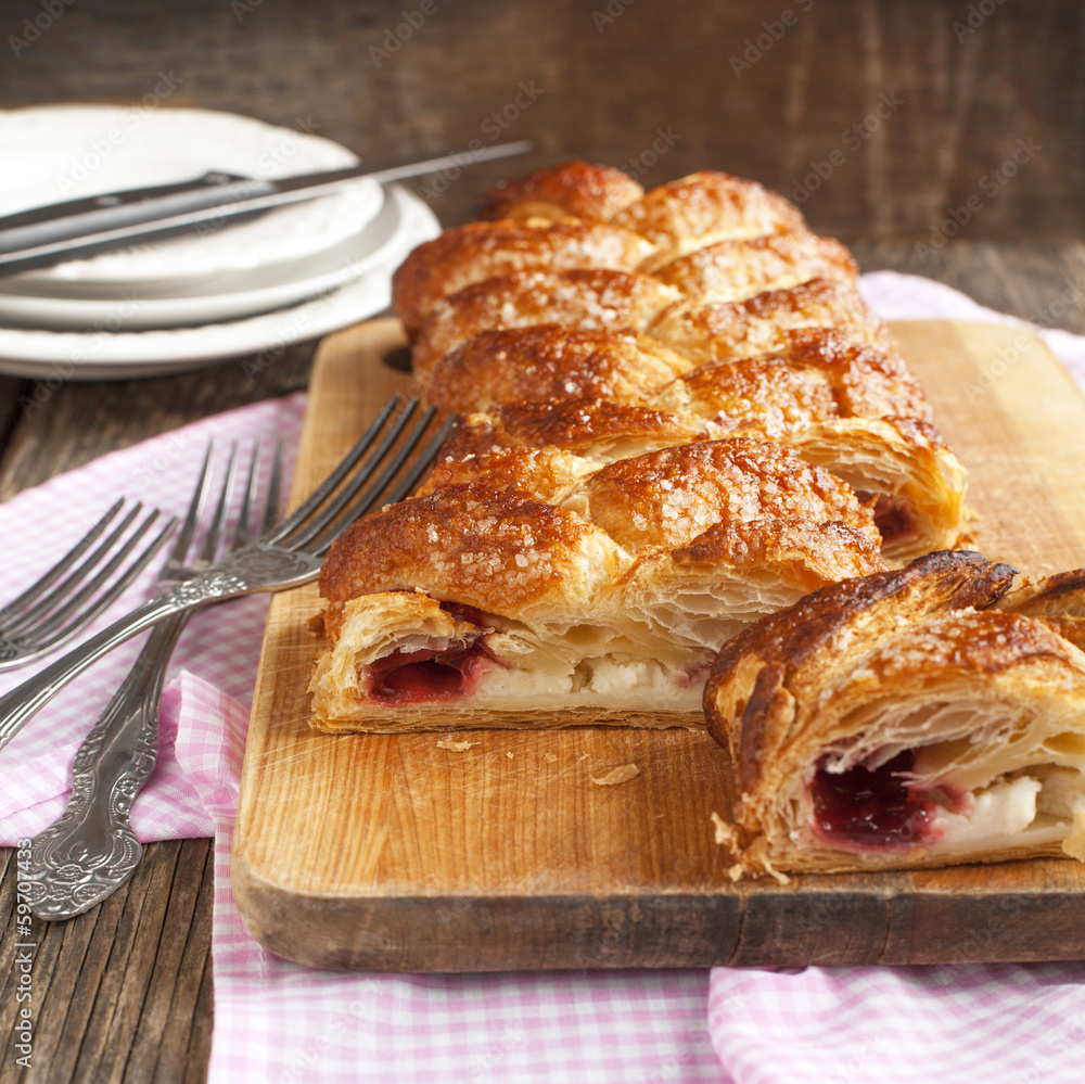 Cheese and strawberry strudel. Selective focus Cheese and strawberry strudel. Selective focus