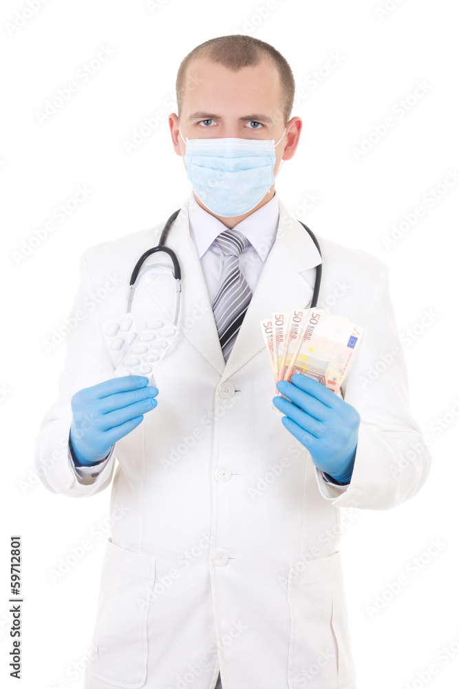 young doctor with package of pills and euro banknotes isolated o young doctor with package of pills and euro banknotes isolated o